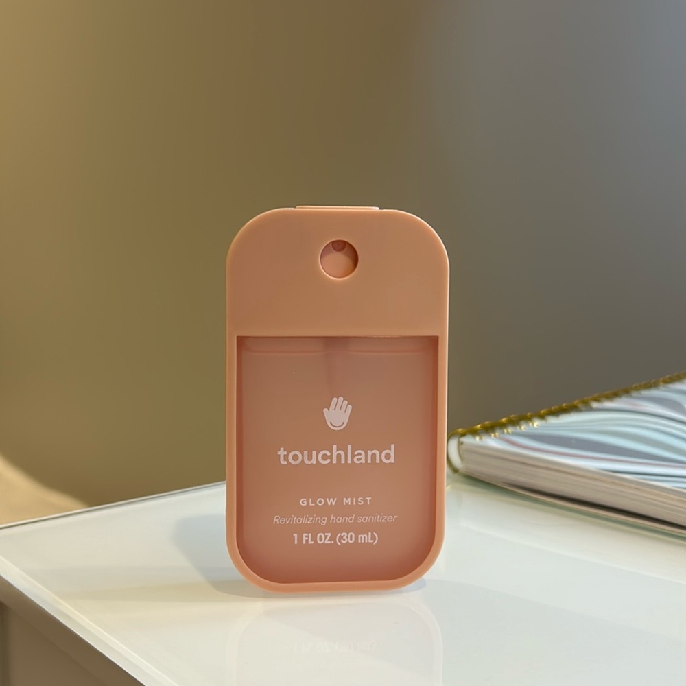 Touch land glow mist hand sanitizer in the scent rosewater